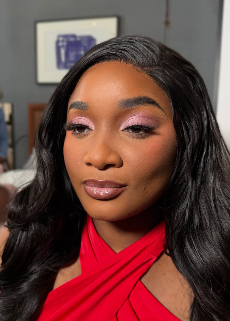 Pink shimmer eye makeup with glossy nude lip