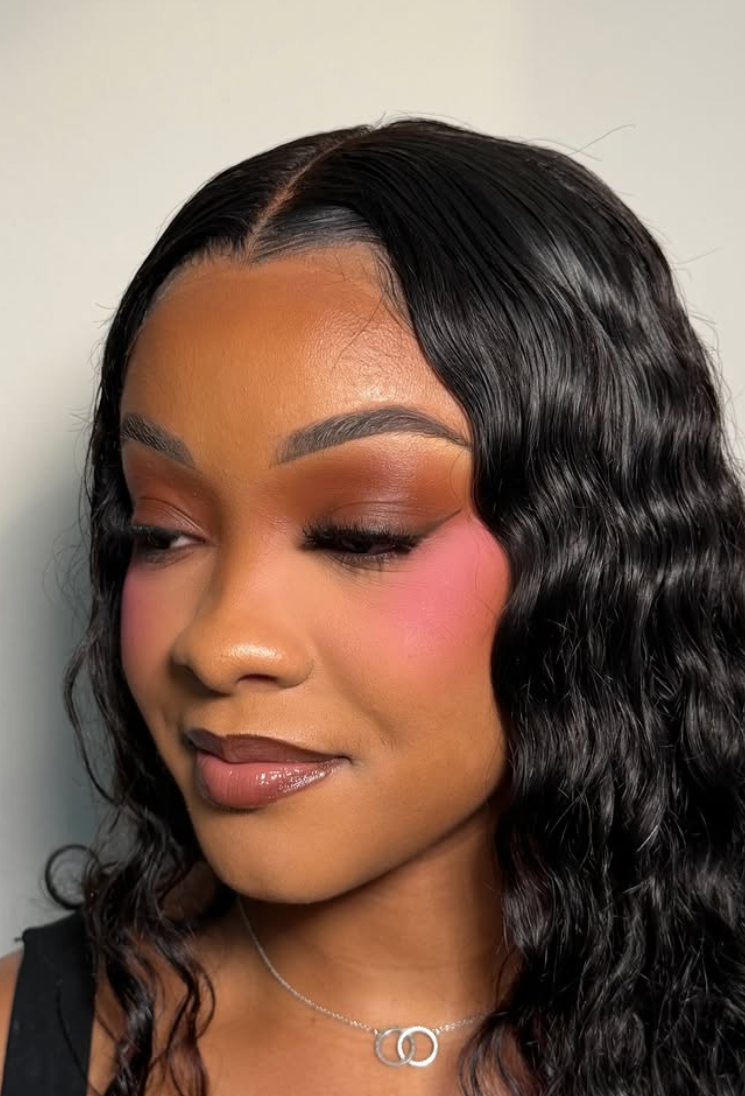 Bronze eye makeup with pink blush and glossy lip